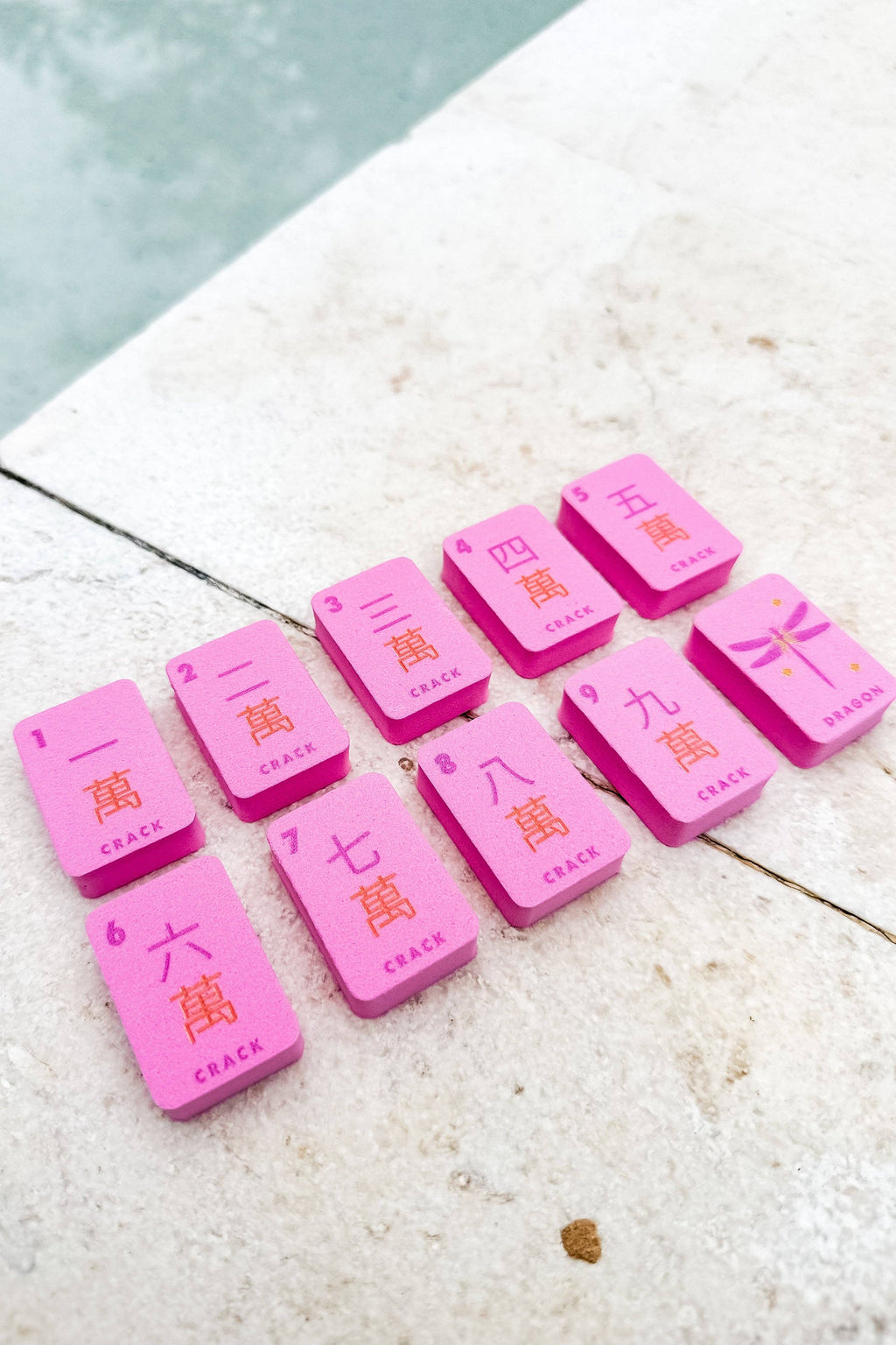 Floating Mahjong Tiles in Floral Pink for the Pool