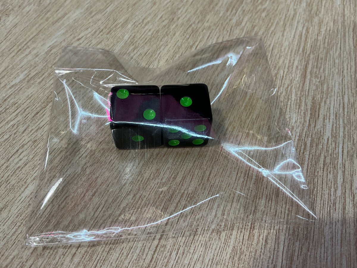 Green on black mahjong dice