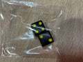 Neon yellow on black mahjong dice