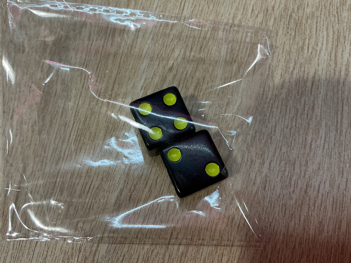 Neon yellow on black mahjong dice