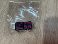 Fuchsia on black dice